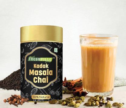 Tea pot with Freshville Kadak Masala Tea 100g, featuring traditional design and vibrant colors, ideal for brewing flavorful tea.