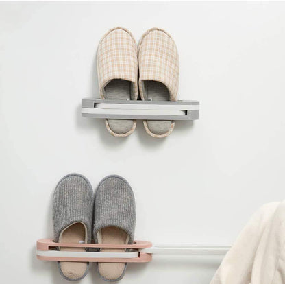 Wukusy 1122 multifunction folding slippers and shoes hanger organizer rack mounted on a wall, ideal for home shoe storage.