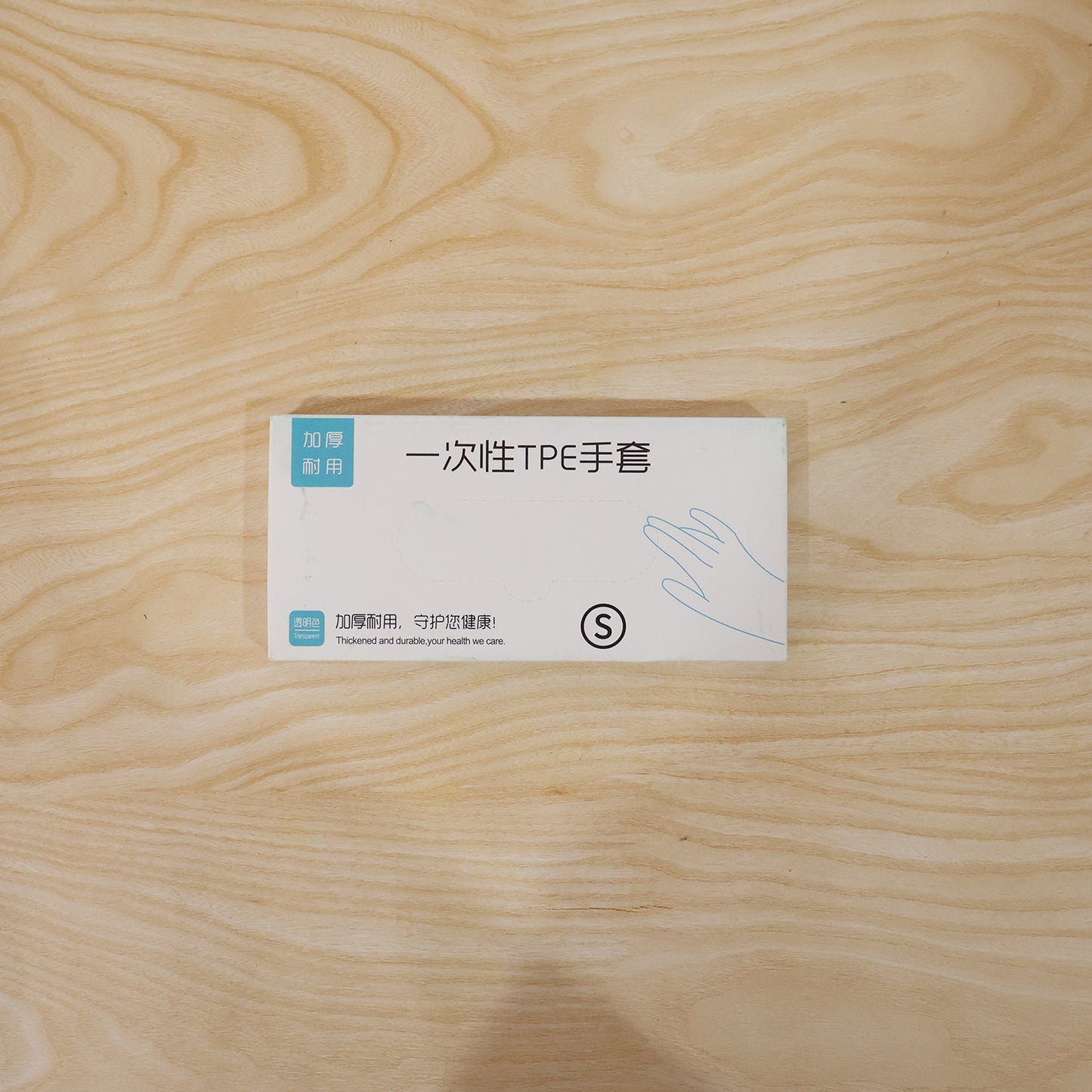 Pair of disposable small plastic gloves from Wukusy, suitable for kitchen food handling and cleaning tasks, shown in the image.