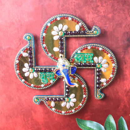 Golden Swastik Shubh Labh wall hanging with Ganesh idol for home decor, featuring intricate design and traditional Indian symbolism.