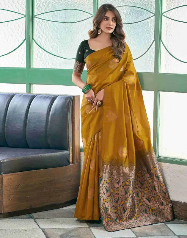 Elegant women’s silk saree from Ekom, Royal Green with golden accents, showcasing intricate traditional craftsmanship.