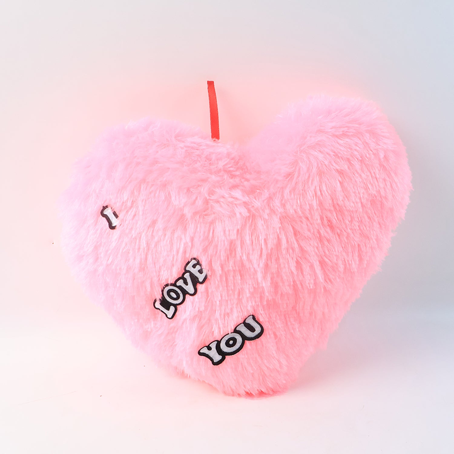 Wukusy soft plush heart-shaped cushion with "I Love You" embroidery, cozy home decor for comfort and decoration.