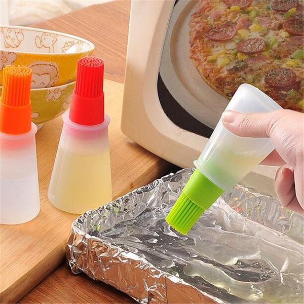 Wukusy 2434 basting brush set with silicone pastry brushes for kitchen cooking and baking tasks, showing three brushes with colorful handles.