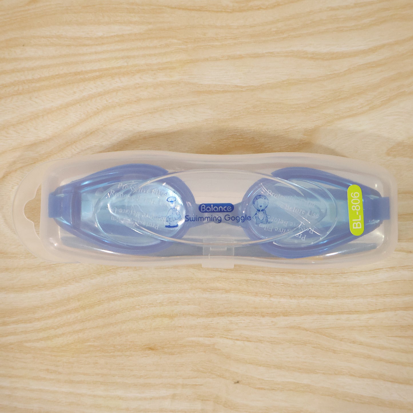 Kids Wukusy swimming goggles with clear lenses and secure fit, designed for comfortable water sports.