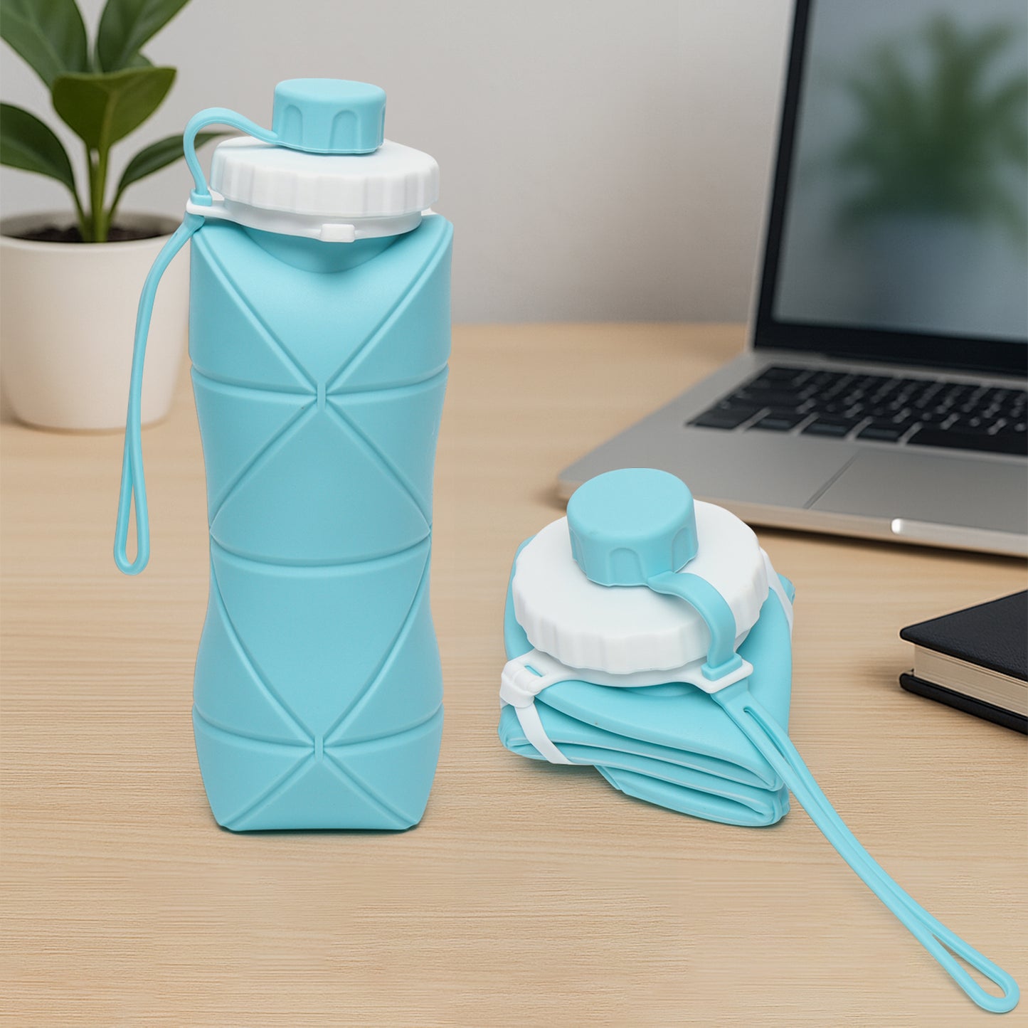 Wukusy 600ml collapsible silicone water bottle for travel, sports, gym, and office, shown in expanded form with blue lid and body.
