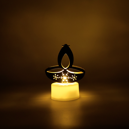 Six golden diya-shaped LED tealight candles for home decor, arranged on a decorative surface with a warm glow.