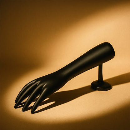 Black hand-shaped jewelry display stand by Wukusy, showcasing rings and bracelets on a sleek, elegant jewelry holder.