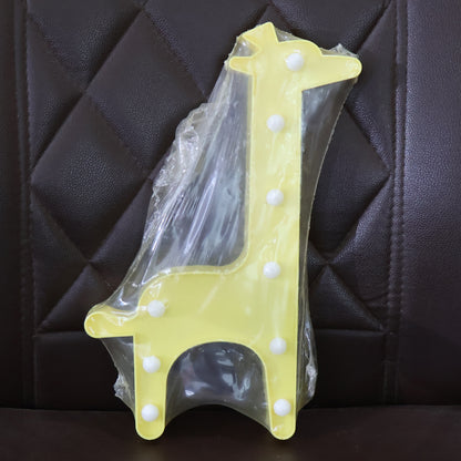 Giraffe-shaped LED night light by Wukusy, decorative home decor with soft lighting, designed for children’s bedrooms and nurseries.