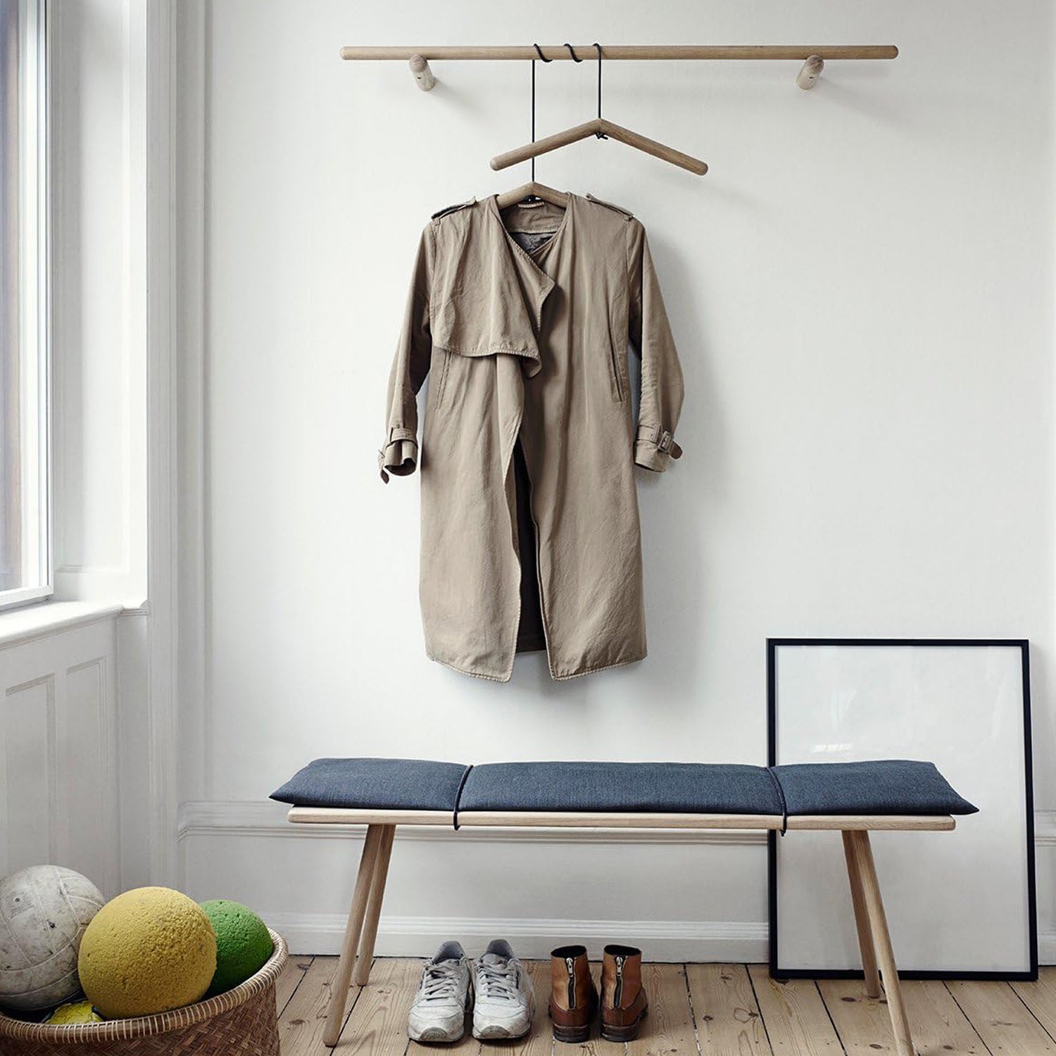 Wooden clothes hanger by Wukusy, sturdy suit and coat hanger made from natural wood for home organization.