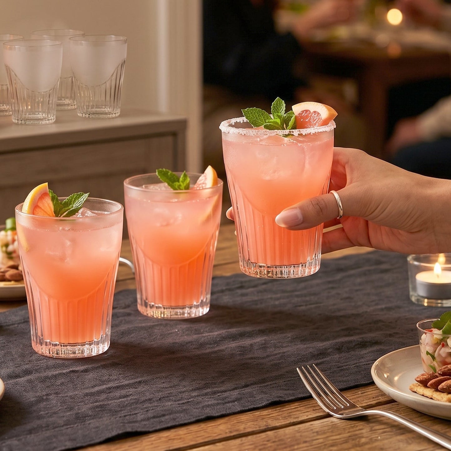 Set of 6 unbreakable plastic juice glasses by Wukusy, clear water tumblers for home use, durable and lightweight.