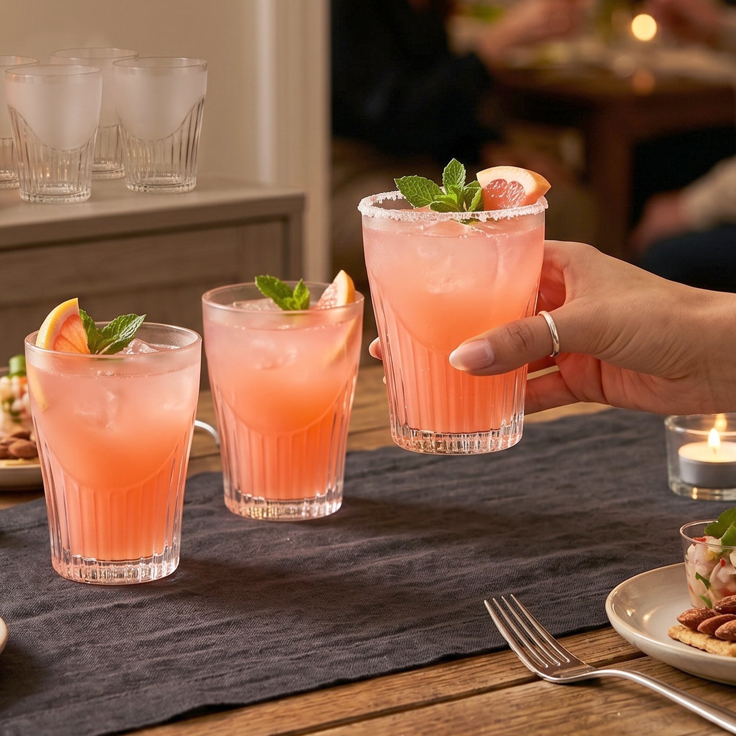 Set of 6 unbreakable plastic juice glasses by Wukusy, clear water tumblers for home use, durable and lightweight.