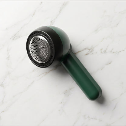 Wukusy rechargeable electric lint remover with cleaning brush, handheld device for removing lint and fuzz from clothing and fabrics.