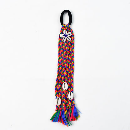Multicolor braided hair accessory by Wukusy featuring a stylish Kodi string bow, perfect for adding vibrant flair to hairstyles.