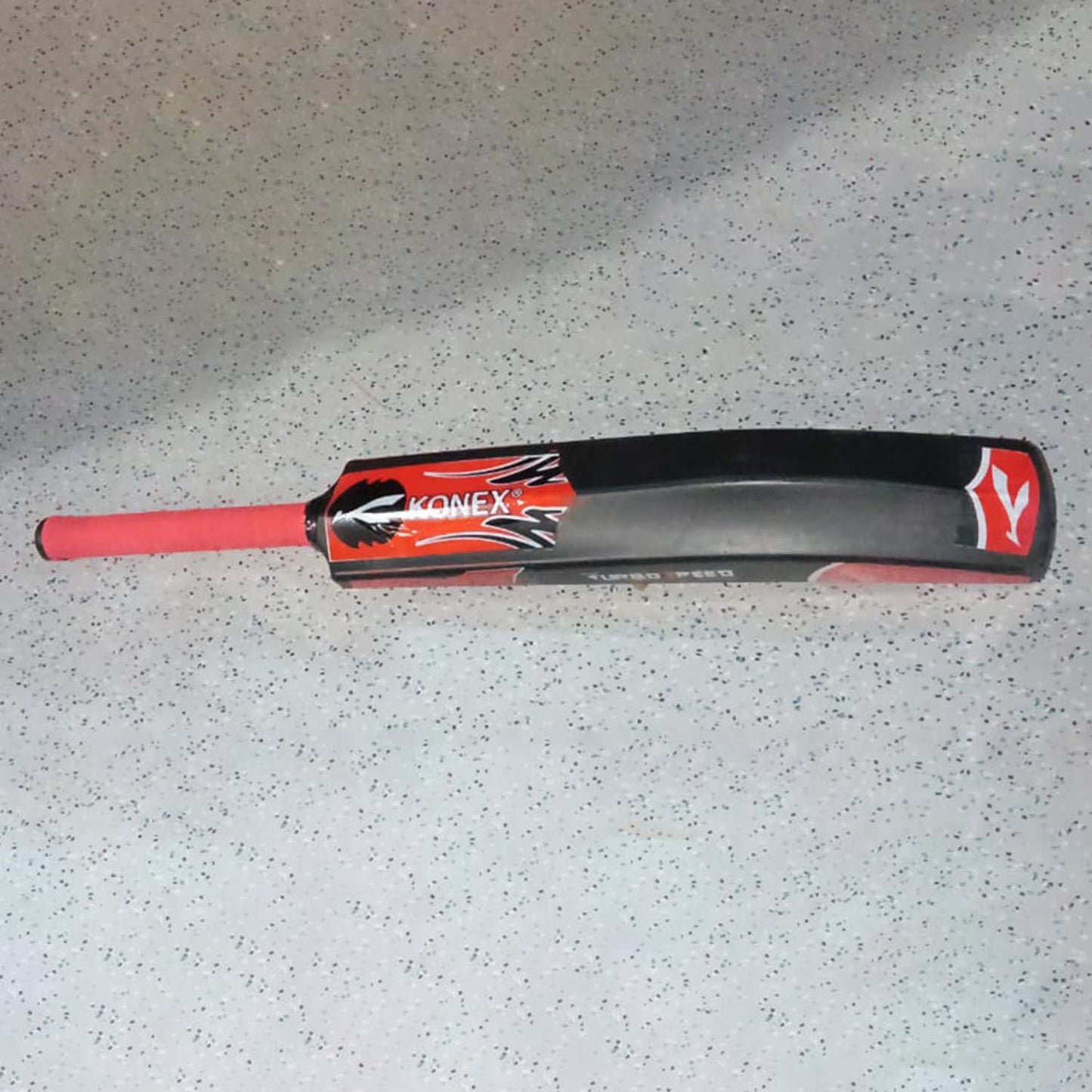 Lightweight durable plastic cricket bat by Wukusy, 87 cm long, with a handle and blade suitable for casual play.