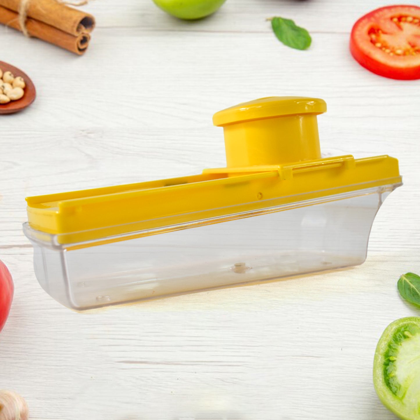 Wukusy yellow multipurpose vegetable and fruit slicer showing multiple sliced vegetables on a white background