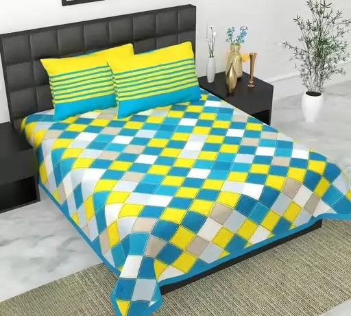 Super soft pure cotton fitted double bedsheet with two pillow covers, 100x90 inches, by Ekom, in a cozy bedroom setting.