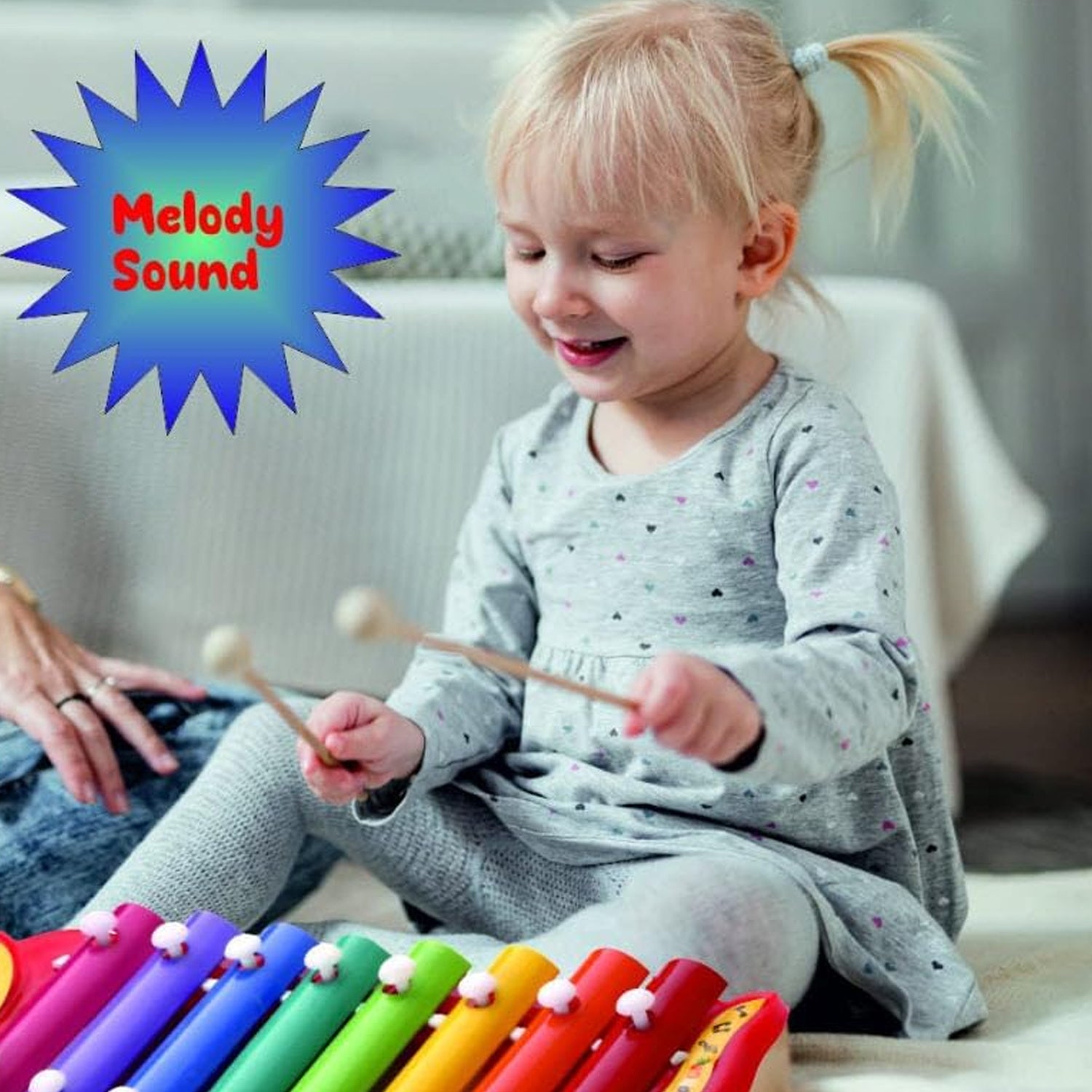 Colorful kids' musical xylophone toy by Wukusy with vibrant keys and wooden frame, perfect for children's music play.