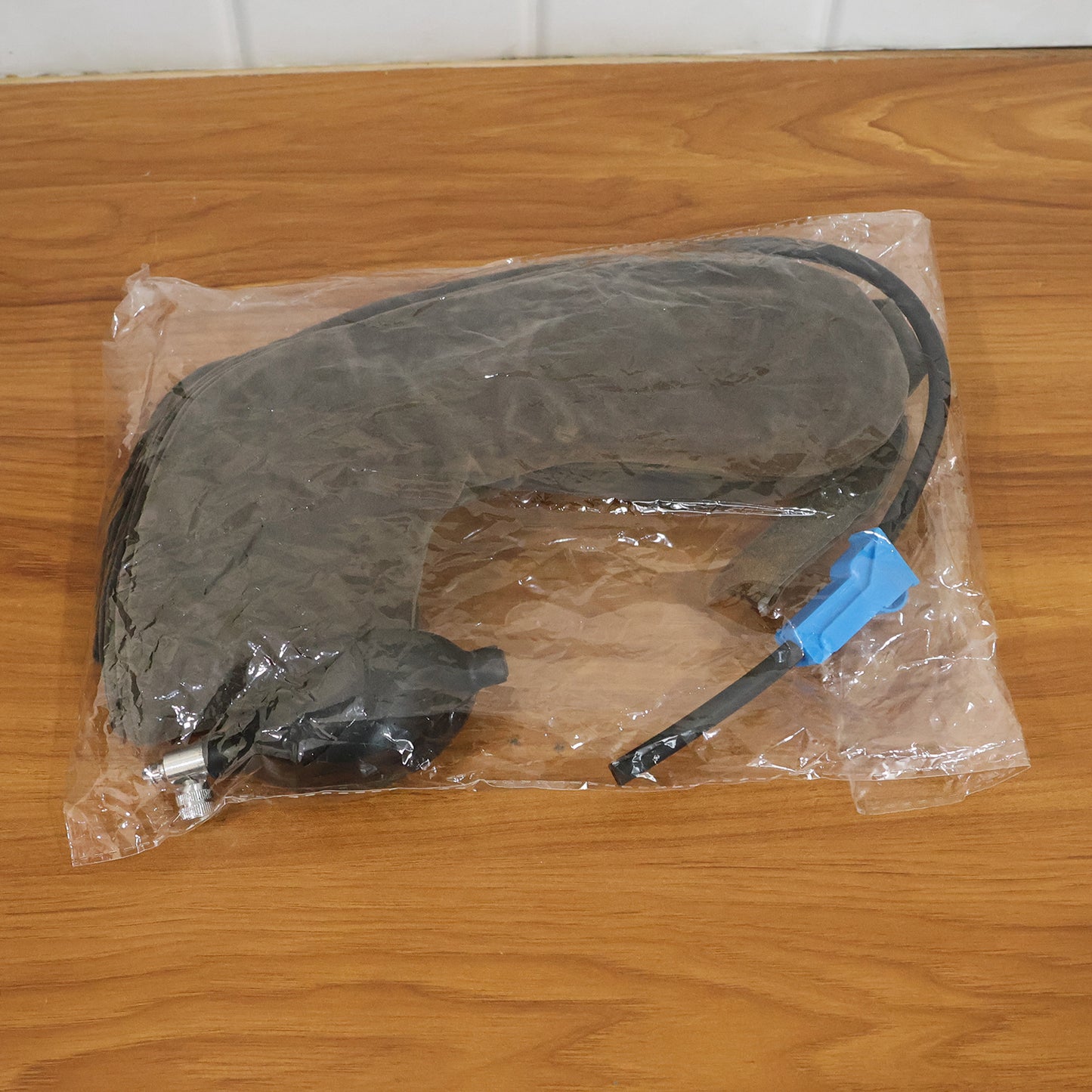 Wukusy 3-layer inflatable cervical neck traction support collar showing adjustable inflation and soft fabric design.
