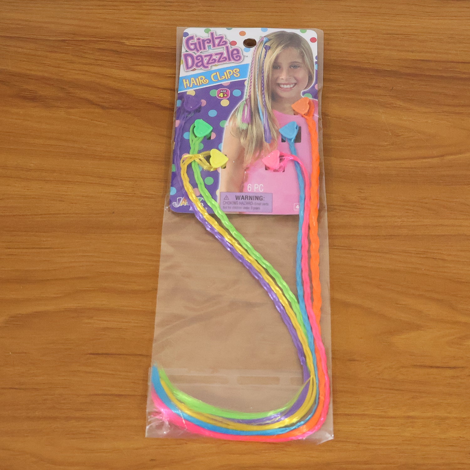 Colorful braided hair extension streaks for girls and kids, featuring vibrant Wukusy hair extensions in a 6-piece set.