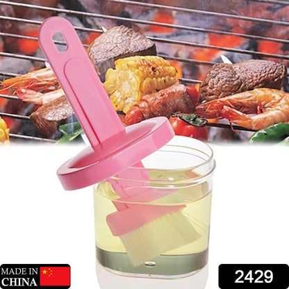 Wukusy 2429 multi-purpose silicone spatula with holder, durable kitchen tool in black, shown with ergonomic handle and flexible blade.