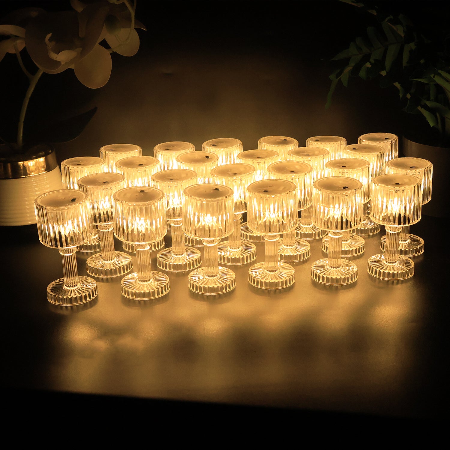 Set of 24 Wukusy LED crystal-effect table lamps for home decor, featuring elegant glass designs with soft glowing light.