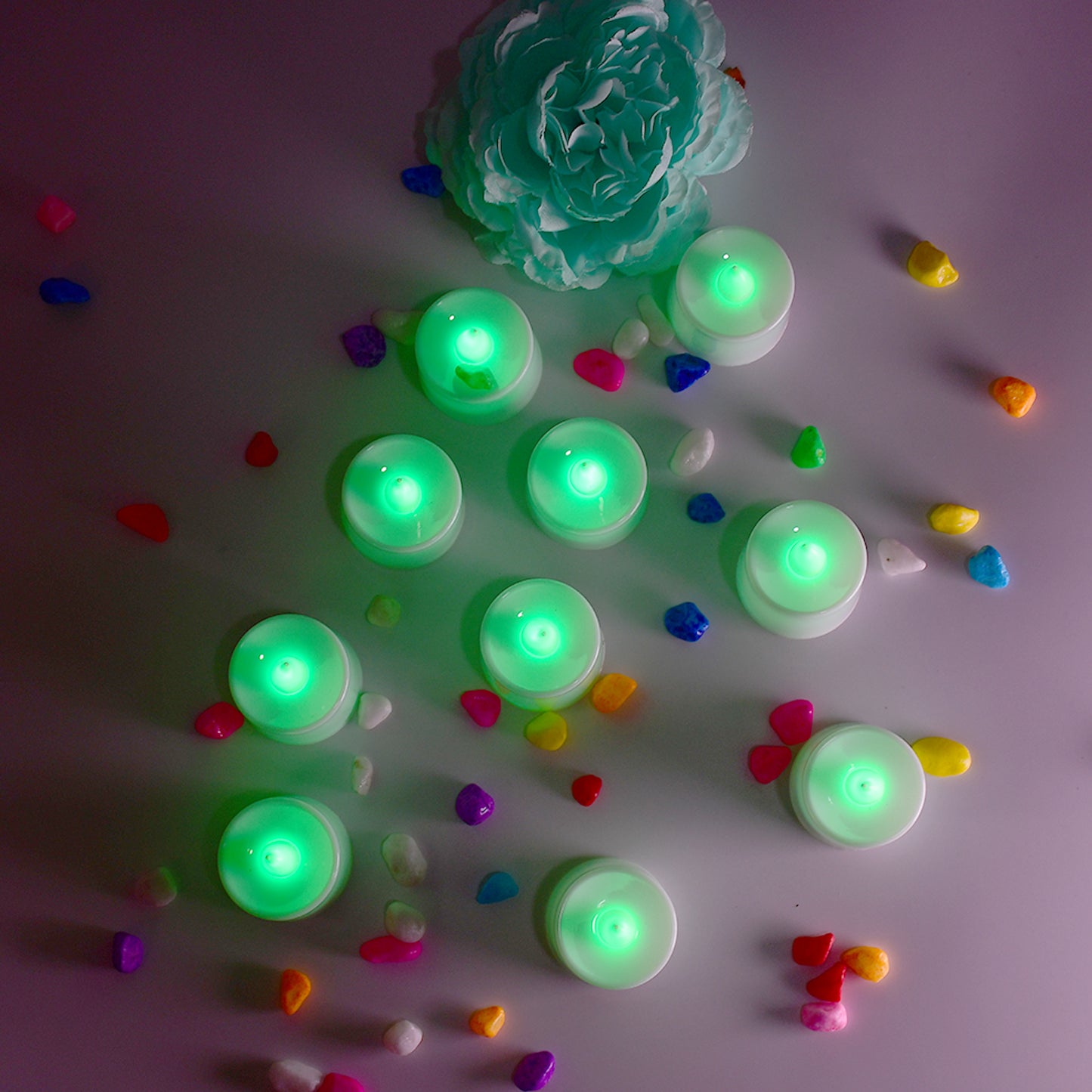 Set of 24 Wukusy green flameless LED tealights, smokeless plastic candles for home decoration with realistic flickering light.