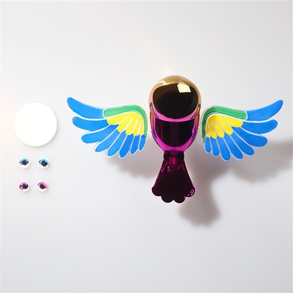 Moving Wind Swinging Bird Wings toy for cars and vehicles, featuring realistic bird wing motion by 4485 brand.