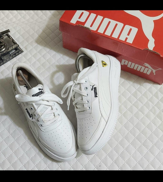 White men's sneakers by 4597, size 6, with clean design and comfortable fit, perfect for casual wear.
