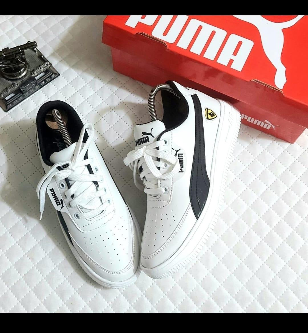 Men's white and black sneakers from 4597, size 6, with stylish design and comfortable fit for casual wear.