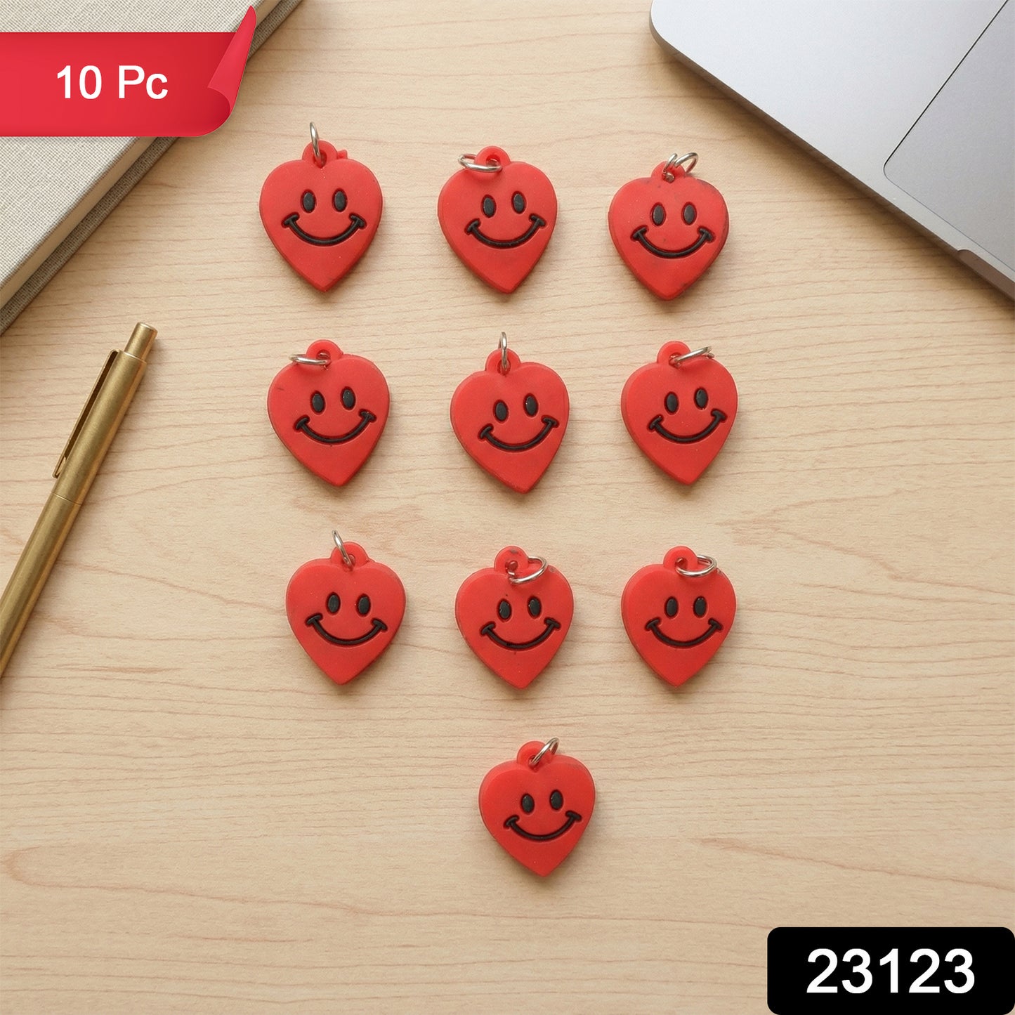 Set of 10 Wukusy smiley heart-shaped bag charm keychains featuring cute, colorful designs and metal keyring attachments.