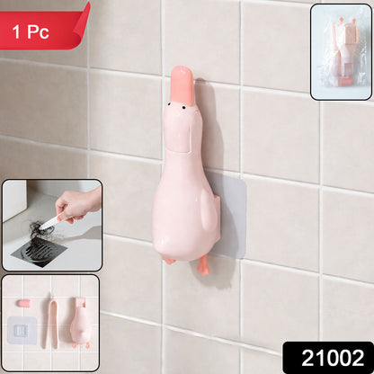 Duck-shaped bathroom hair catcher and organizer by Wukusy, showing the plastic duck design for hair collection in the shower.