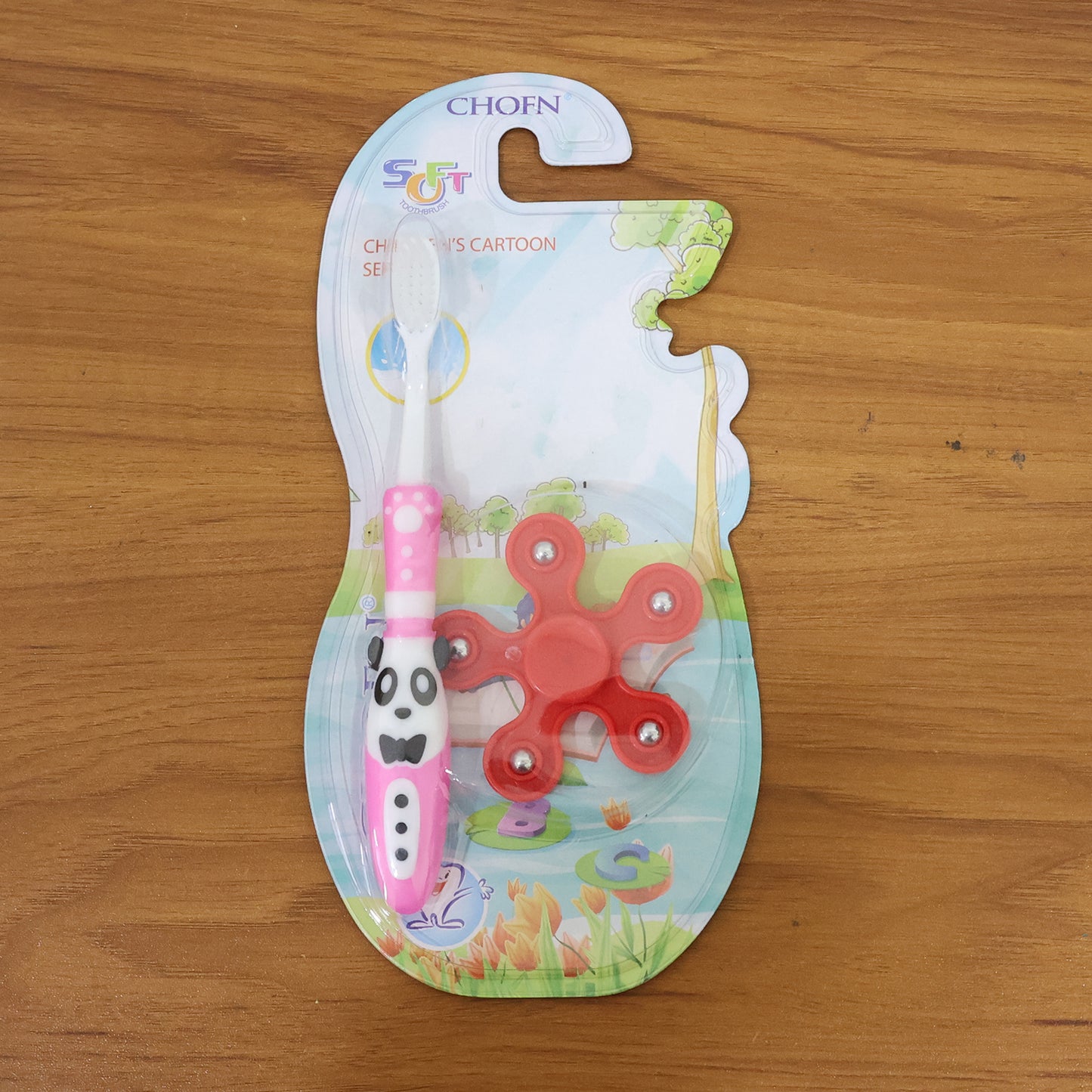 Kids toothbrush and fidget spinner toy set by Wukusy, featuring a colorful toothbrush and spinning toy for children.