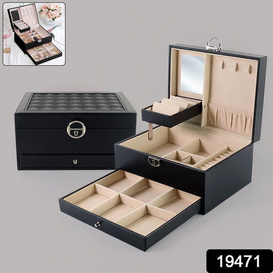 Wukusy multi-layer jewelry organizer box with compartments for rings, necklaces, and earrings, shown open with jewelry inside.