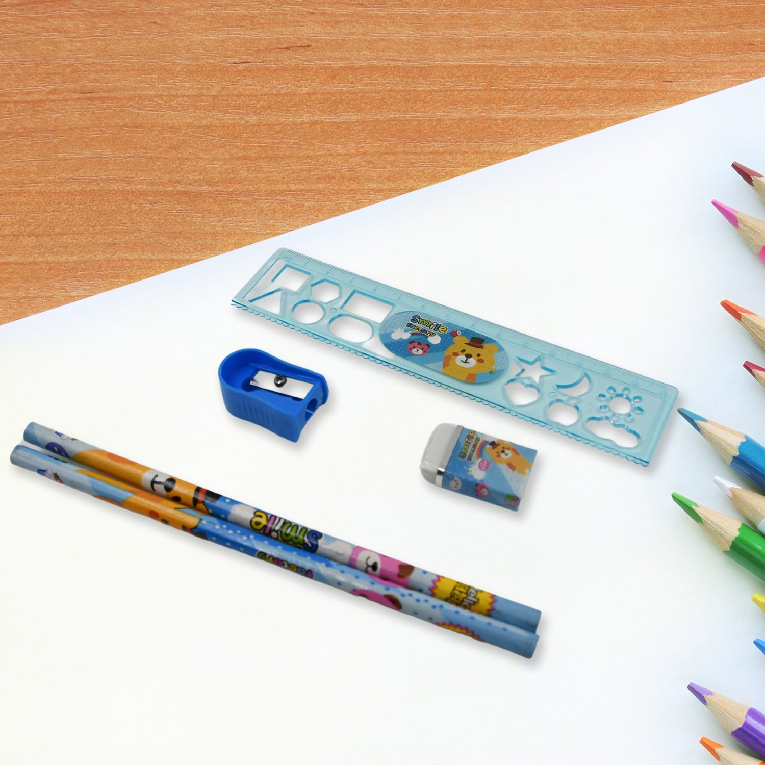 Wukusy stationery kit for kids includes wooden pencil sharpener, eraser, notebook, scale, and zip bag in a 6-piece set.