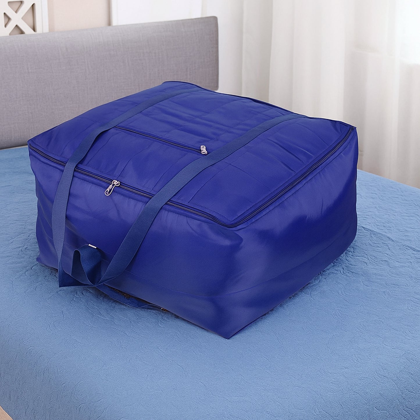 Wukusy blanket storage bag in 60x47x33 cm, foldable fabric with handles for organizing and storing blankets or linens.