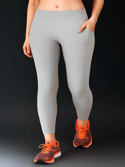 Ekom women's breathable and stretchable yoga tights with a high waistband, ideal for gym workouts and activewear.