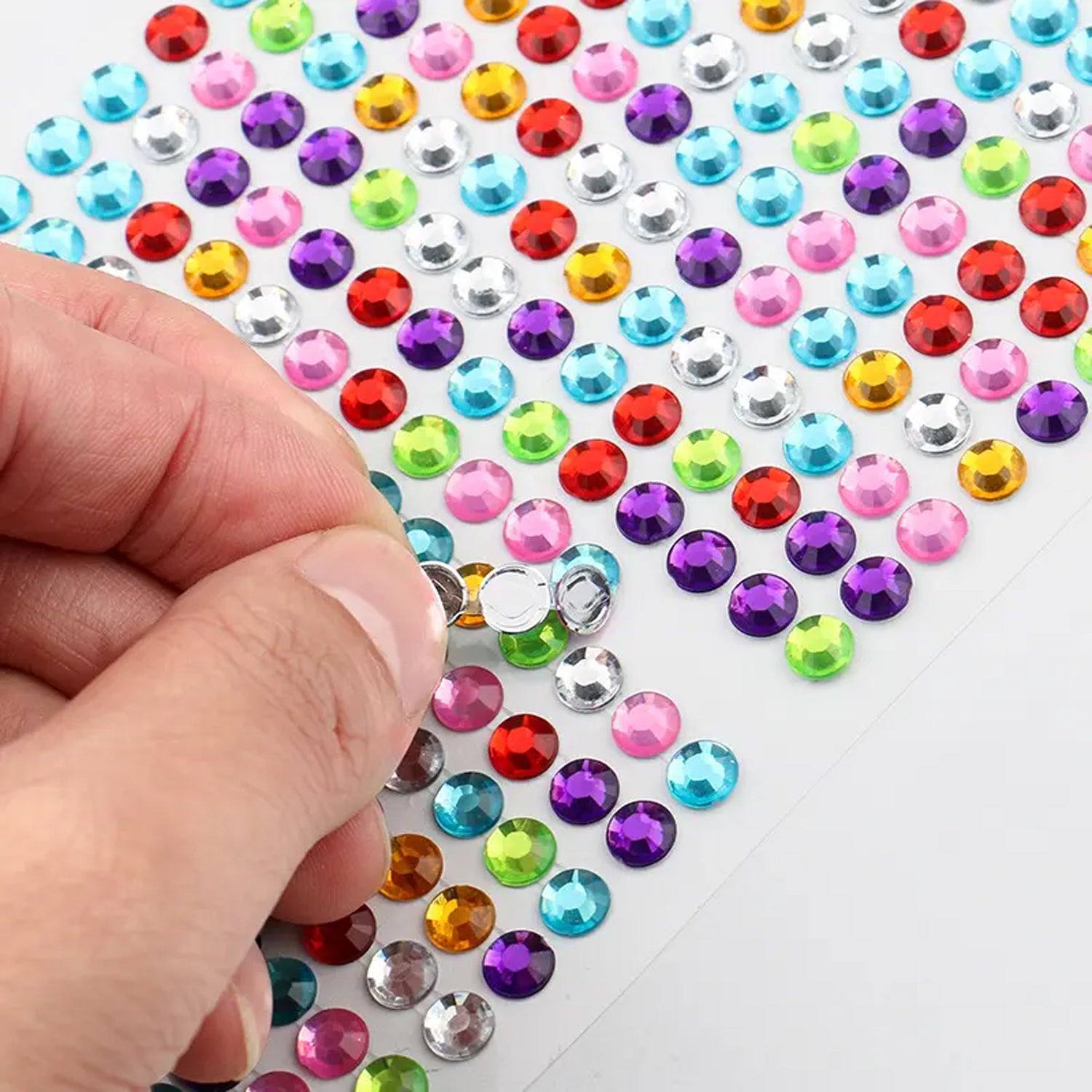 Wukusy self-adhesive shining crystal stones in various shapes for art, craft, jewelry, mobile decoration, and school projects.