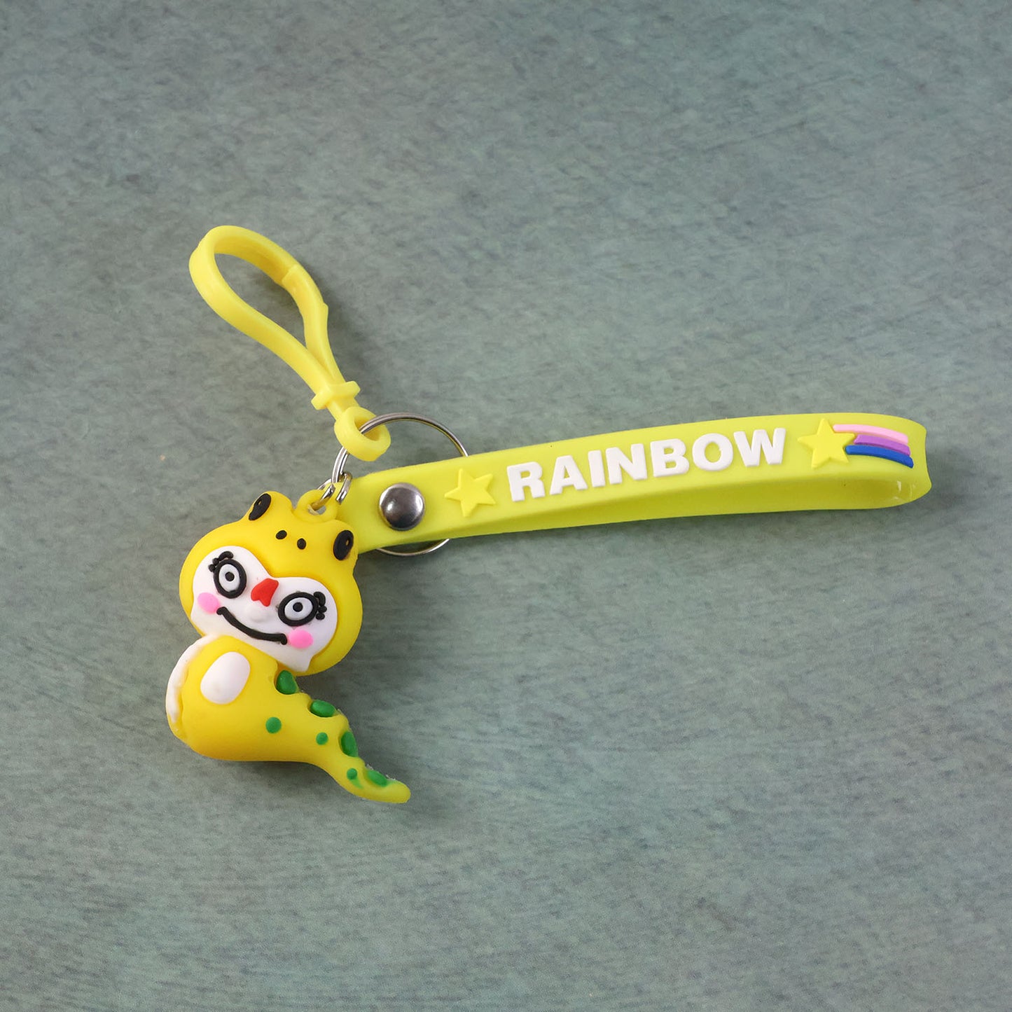 Cute cartoon dinosaur keychain from Wukusy, featuring a colorful, playful dinosaur design on a keyring.