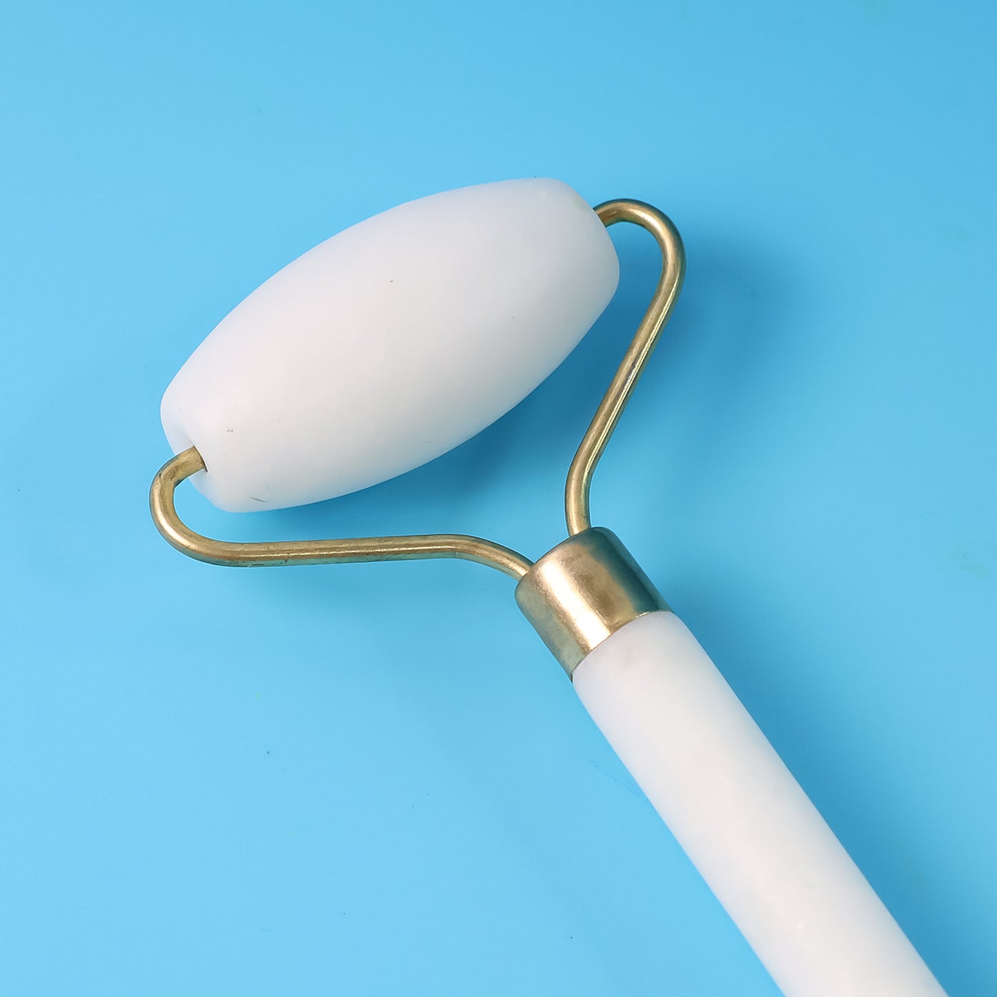 Wukusy dual-ended face massage roller with ergonomic handles, designed for facial skin massage and relaxation.