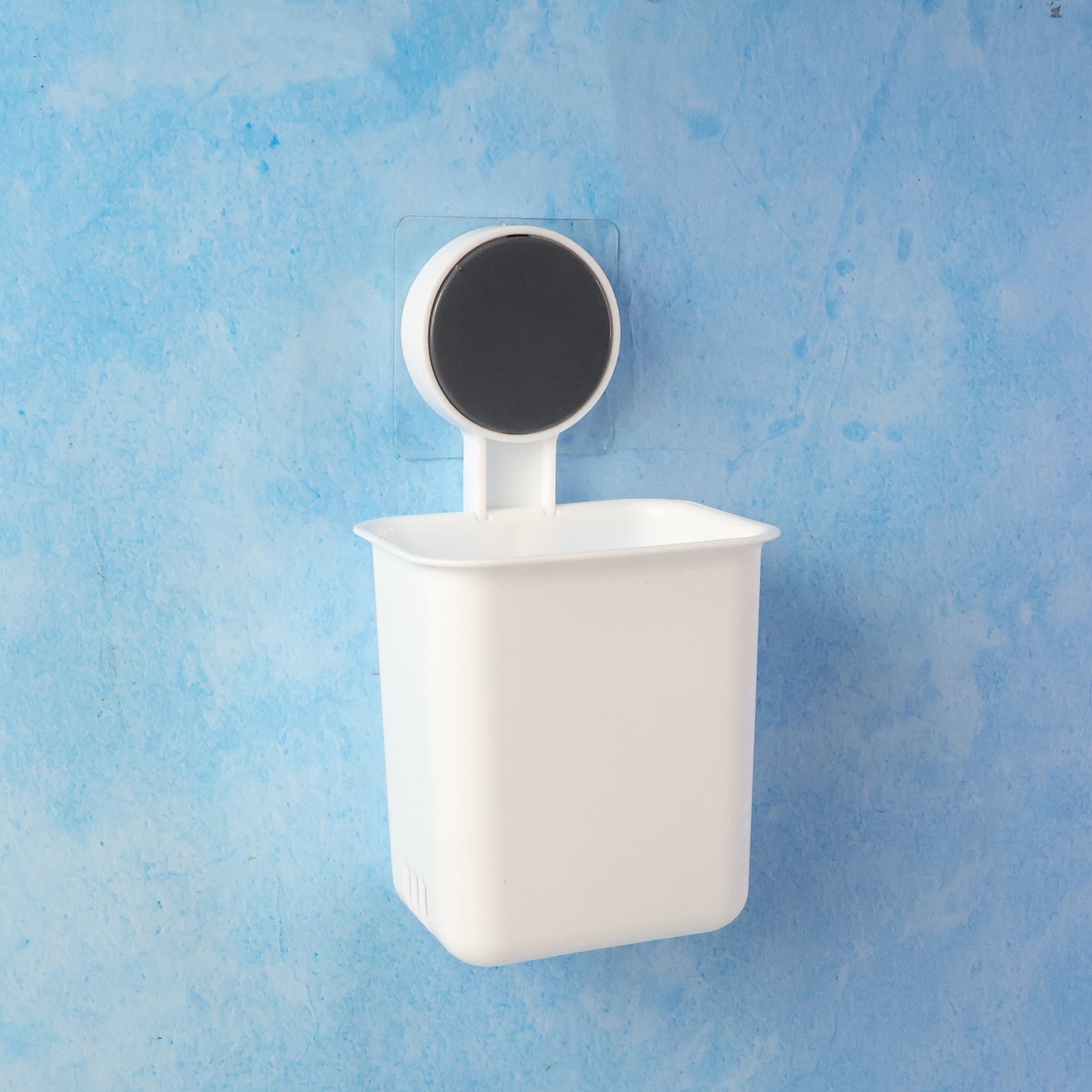 Wall-mounted Wukusy toothbrush holder and bathroom storage organizer with multiple slots for toothbrushes and toothpaste.