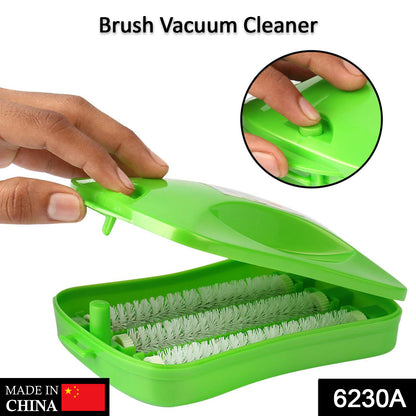 Wukusy 6230a plastic handheld carpet roller brush with dust crumb collector for wet and dry cleaning, shown in use on carpet.