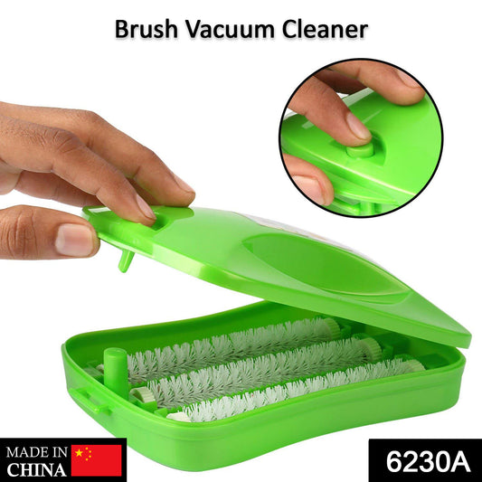 Wukusy 6230a plastic handheld carpet roller brush with dust crumb collector for wet and dry cleaning, shown in use on carpet.