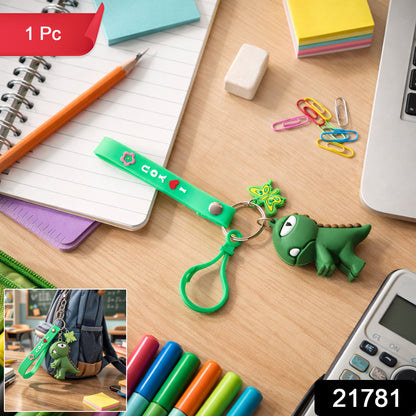 Cute dinosaur cartoon keychain with silicone strap from Wukusy, featuring a colorful, playful dinosaur design on a keyring.