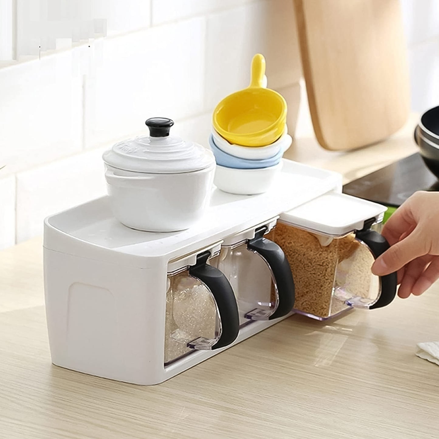 Wukusy Grinss modular spice storage box set with three clear plastic containers and black lids for organized spice storage.