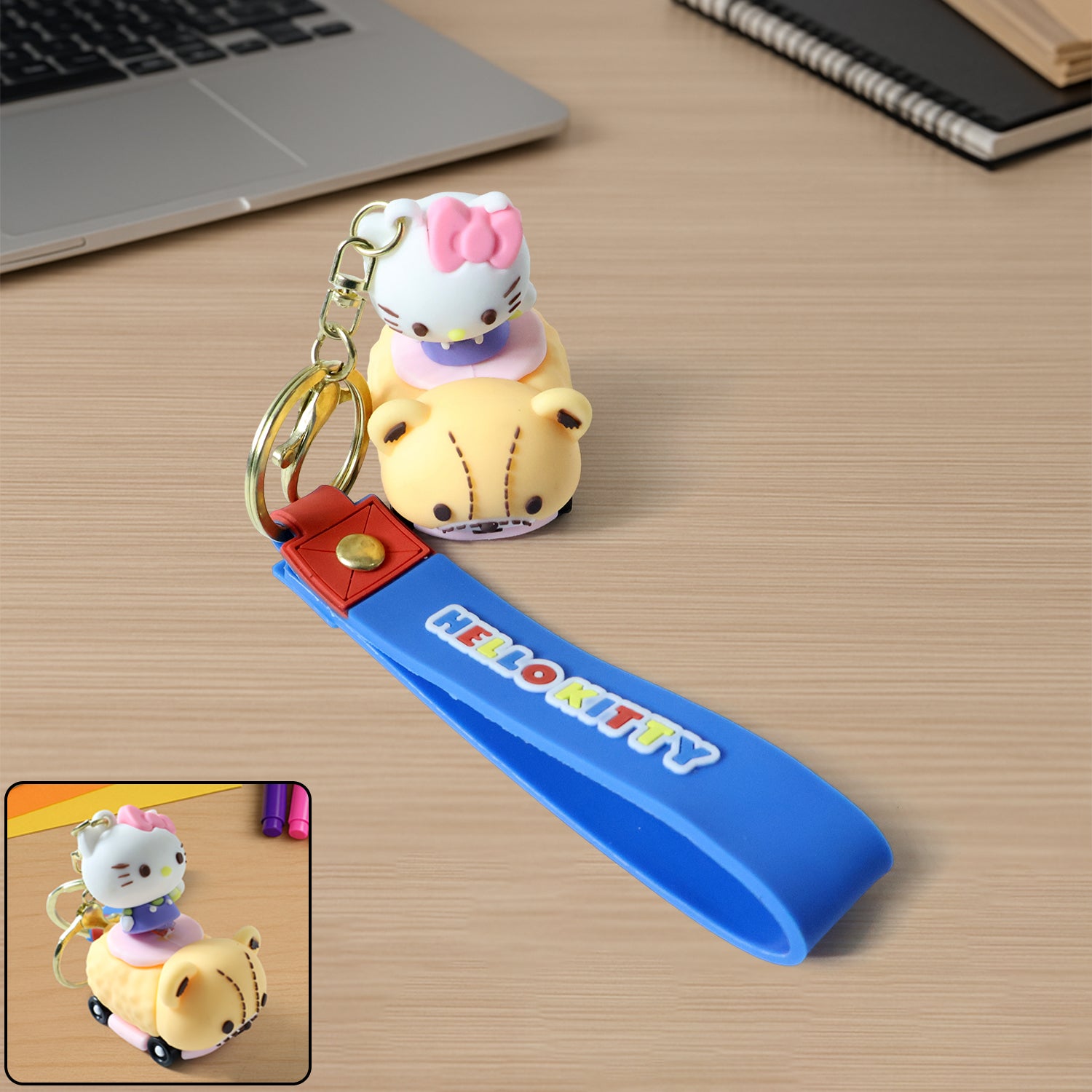 Silicone keychain featuring a cute cartoon cat riding a toy car, designed by Wukusy, with colorful and playful details.