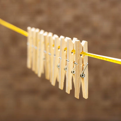 Set of 20 heavy duty bamboo wooden cloth clips or pegs from Wukusy, ideal for hanging laundry and fabric.