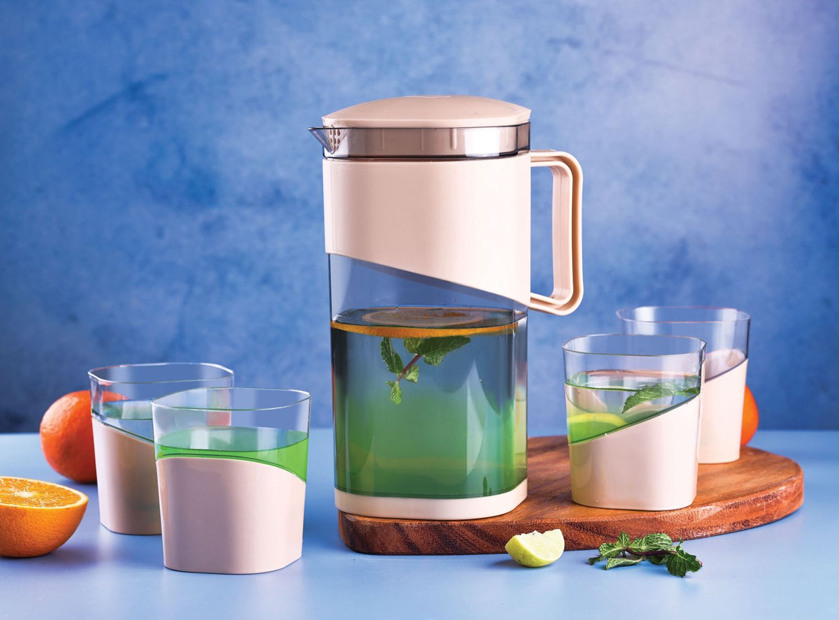 Square water jug with lid and four glass cups, BPA-free plastic set for water, juice, or wine storage and serving in a home kitchen