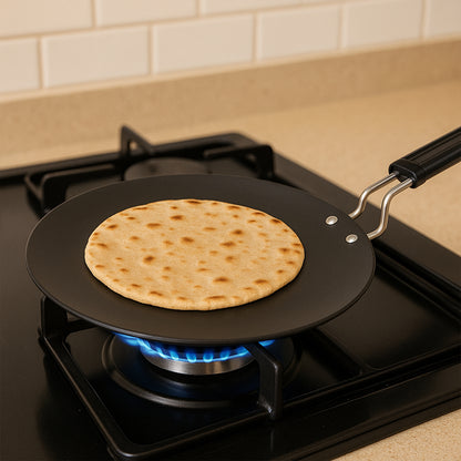 Wukusy 9-inch compact non-stick flat roti tawa for home cooking, with a smooth non-stick surface and sturdy handle.