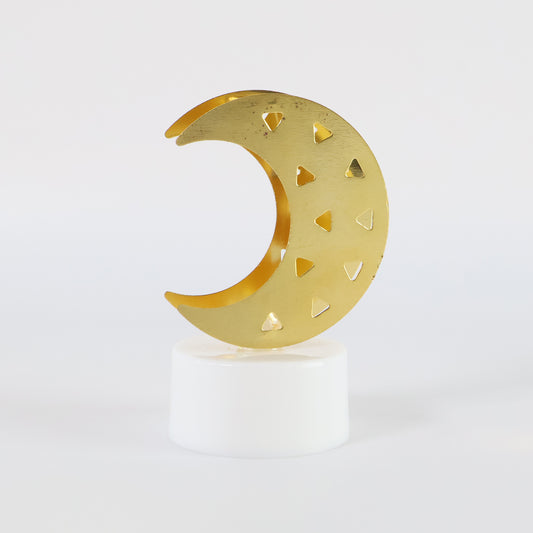 Set of four Wukusy decorative moon-shaped flameless LED candles for home decor, featuring soft glow and moon design.