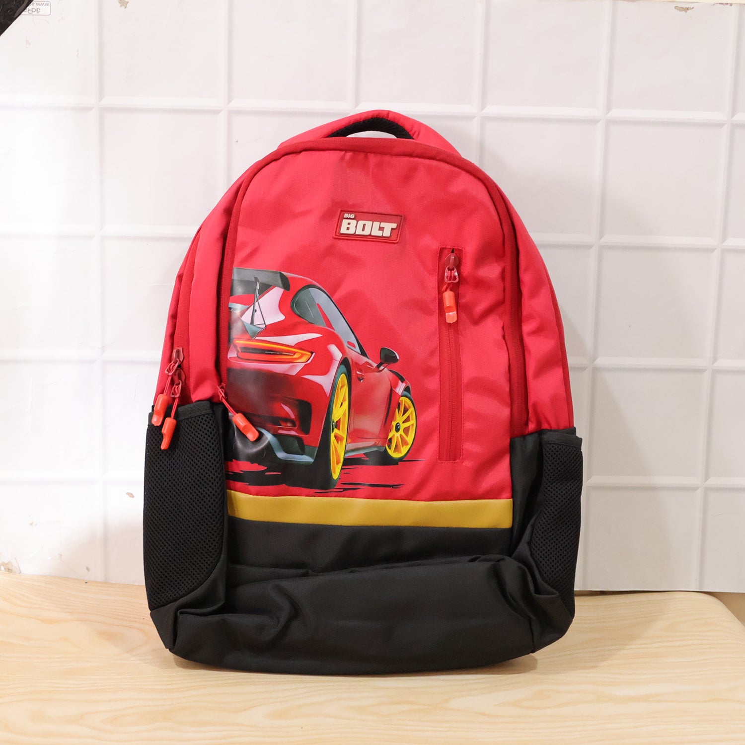 Colorful 19-inch Wukusy school bag with car design for kids, featuring vibrant graphics and adjustable straps.